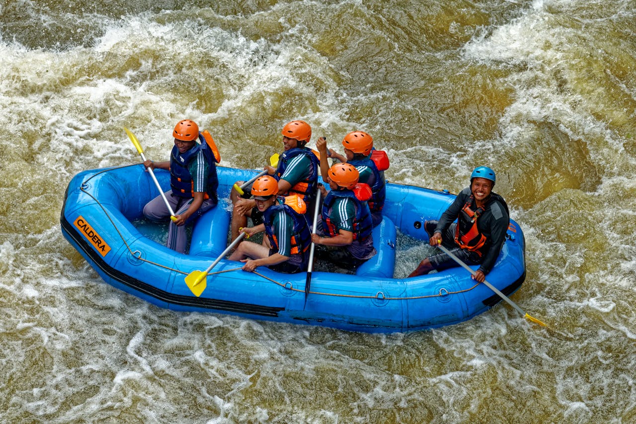 creative-02 Experience thrilling rafting adventure on Cikidang River, West Java, Indonesia.