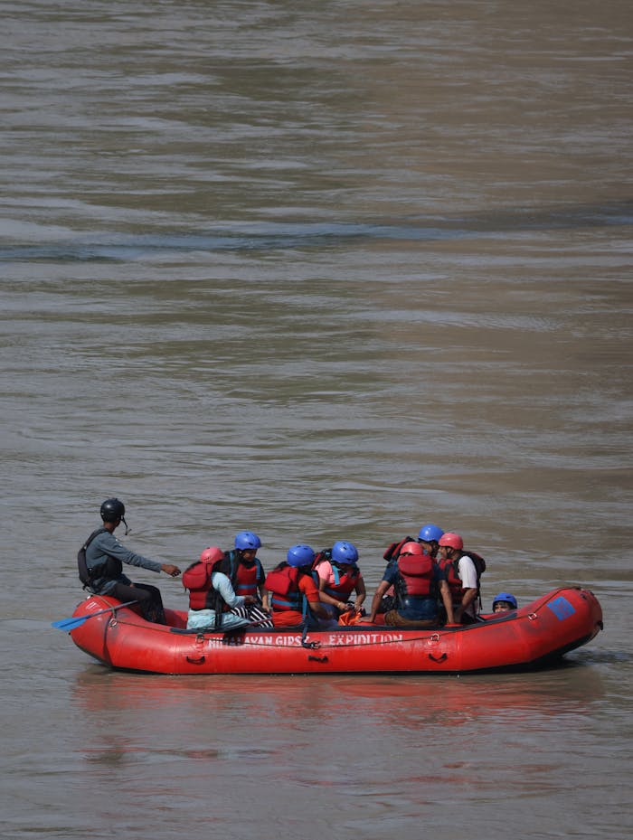 A group of people enjoys rafting on the Ganges River in Rishikesh, India.